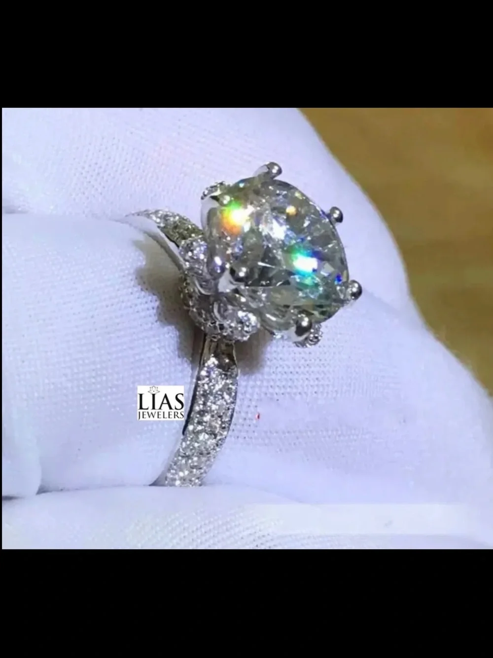 New 18k white gold engagement ring